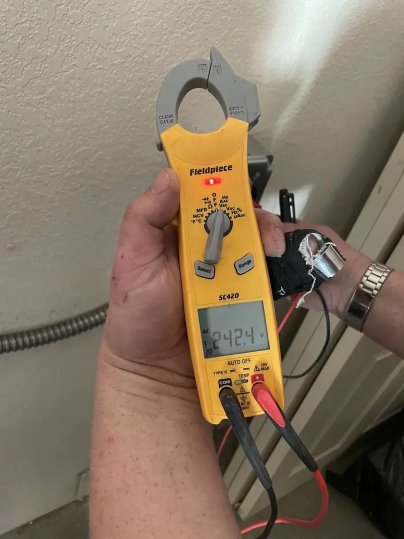 Voltage testing with clamp meter during Circuit Breaker Repair in Herriman